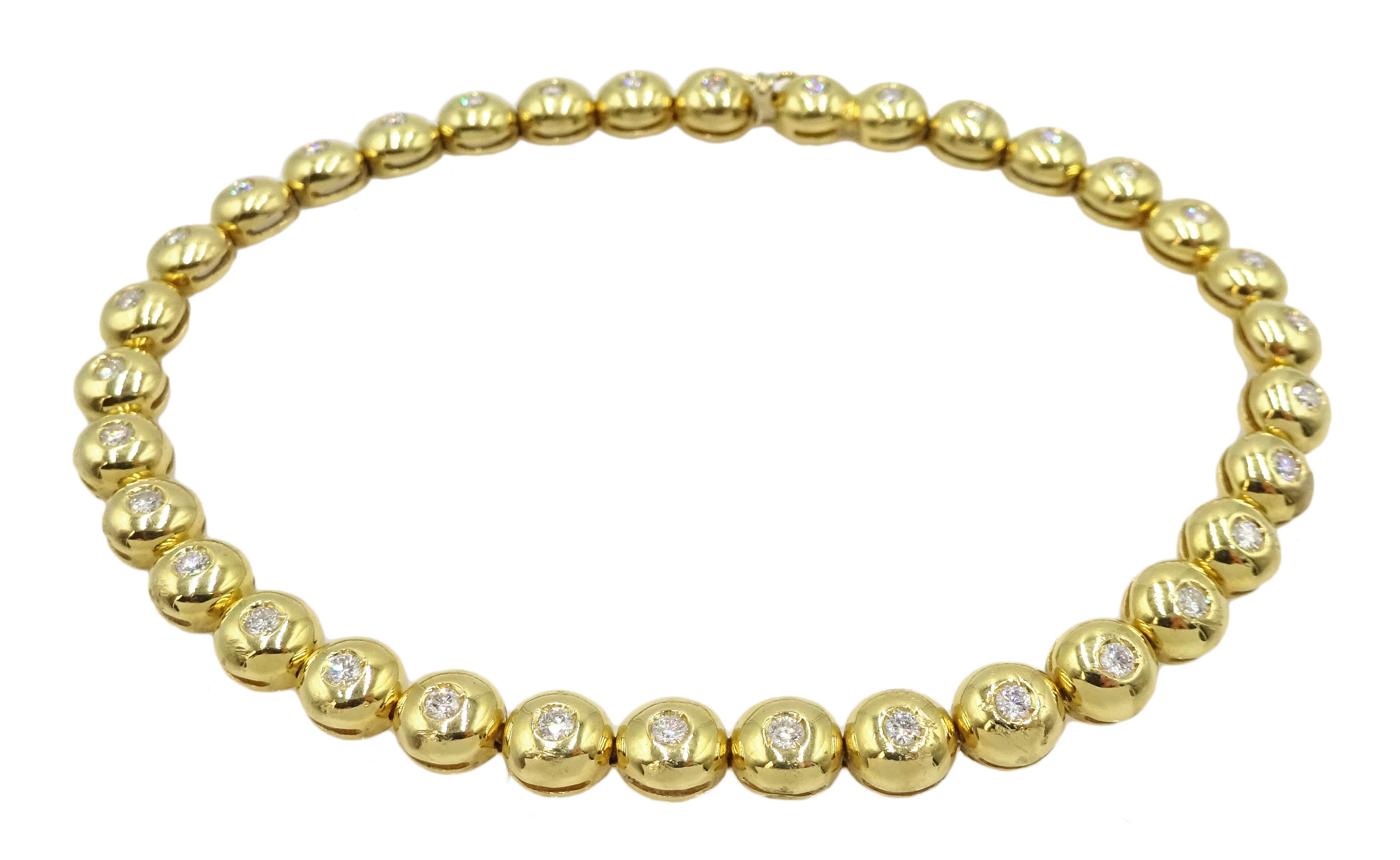 18ct gold rubover diamond line bracelet, stamped 750, total diamond weight 1.