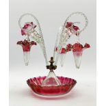 Victorian cranberry and clear glass epergne with trumpet shape vases and baskets on a crimped