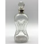 Moulded glass waisted decanter with facet cut stopper and silver collar Condition