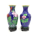 Pair of 20th Century Chinese cloisonne vases decorated with flowers and leaves on a blue ground and