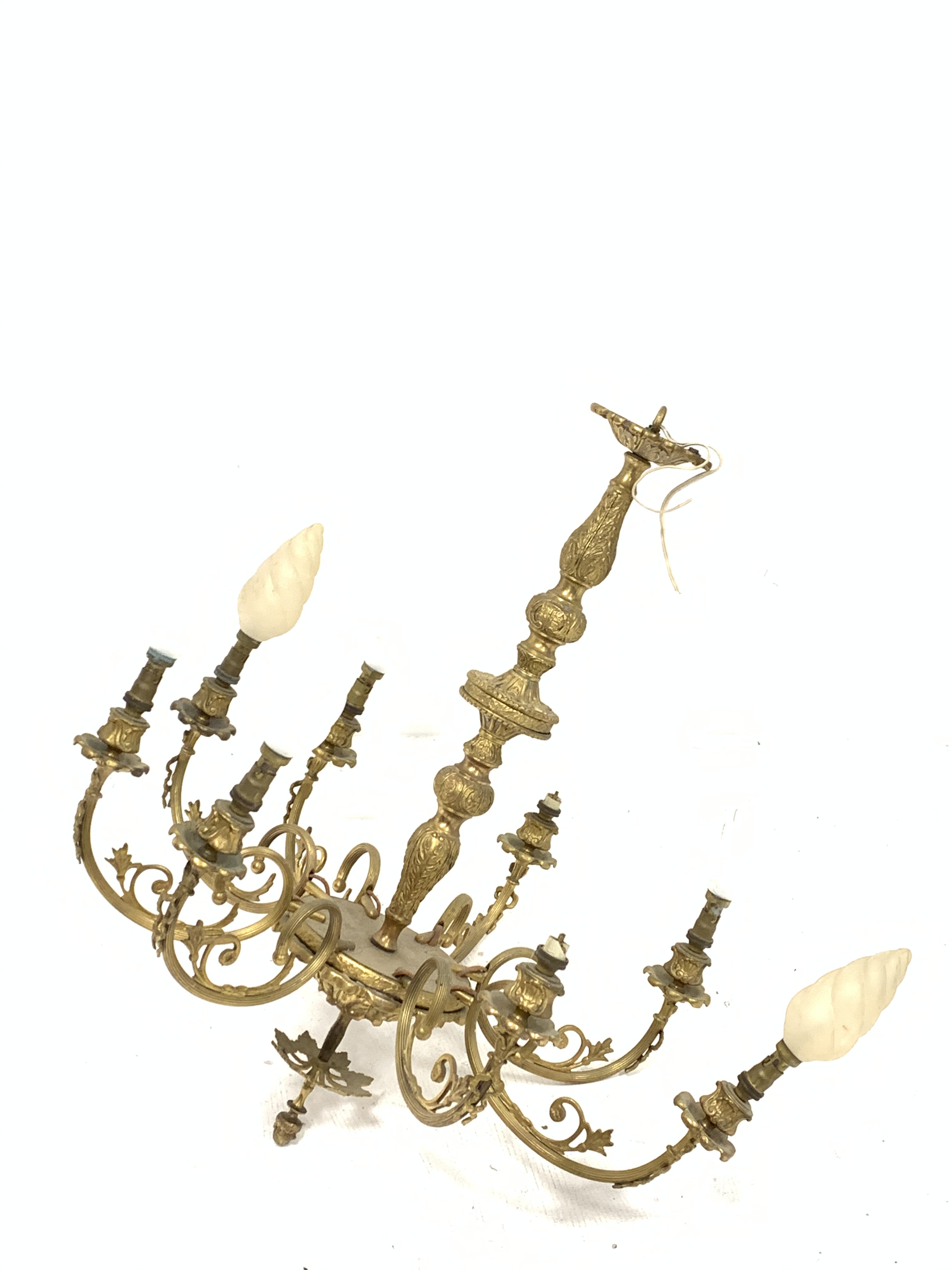 Gilt brass eight light electrolier with baluster stem and scroll branches H66cm Condition