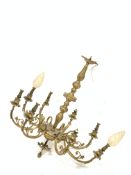 Gilt brass eight light electrolier with baluster stem and scroll branches H66cm Condition
