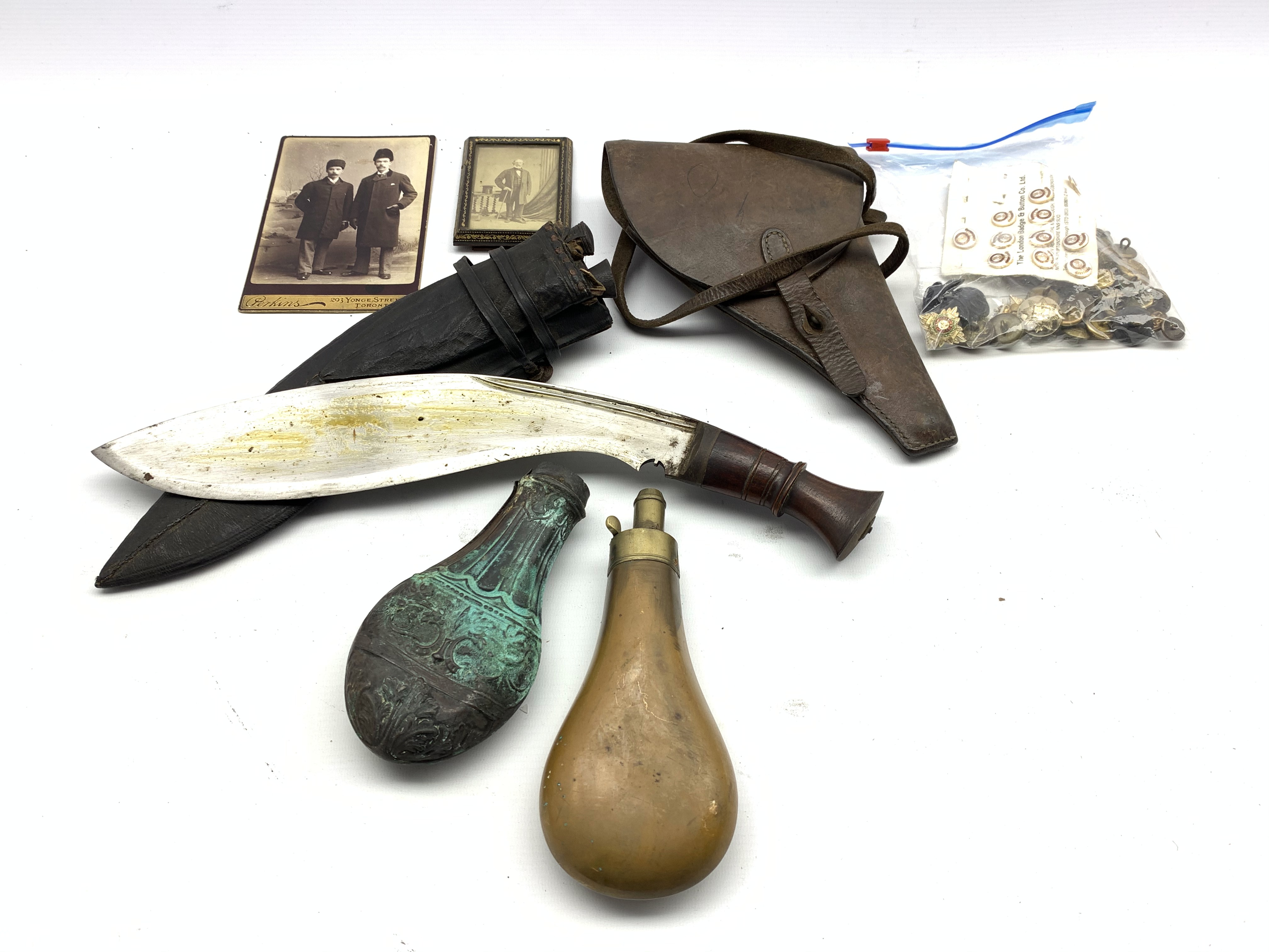 Kukhri and two skinning knives in scabbard, powder flask, leather holster,