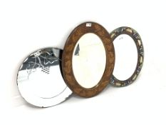 Early 20th century simulated marquetry framed oval wall mirror with bevelled plate,