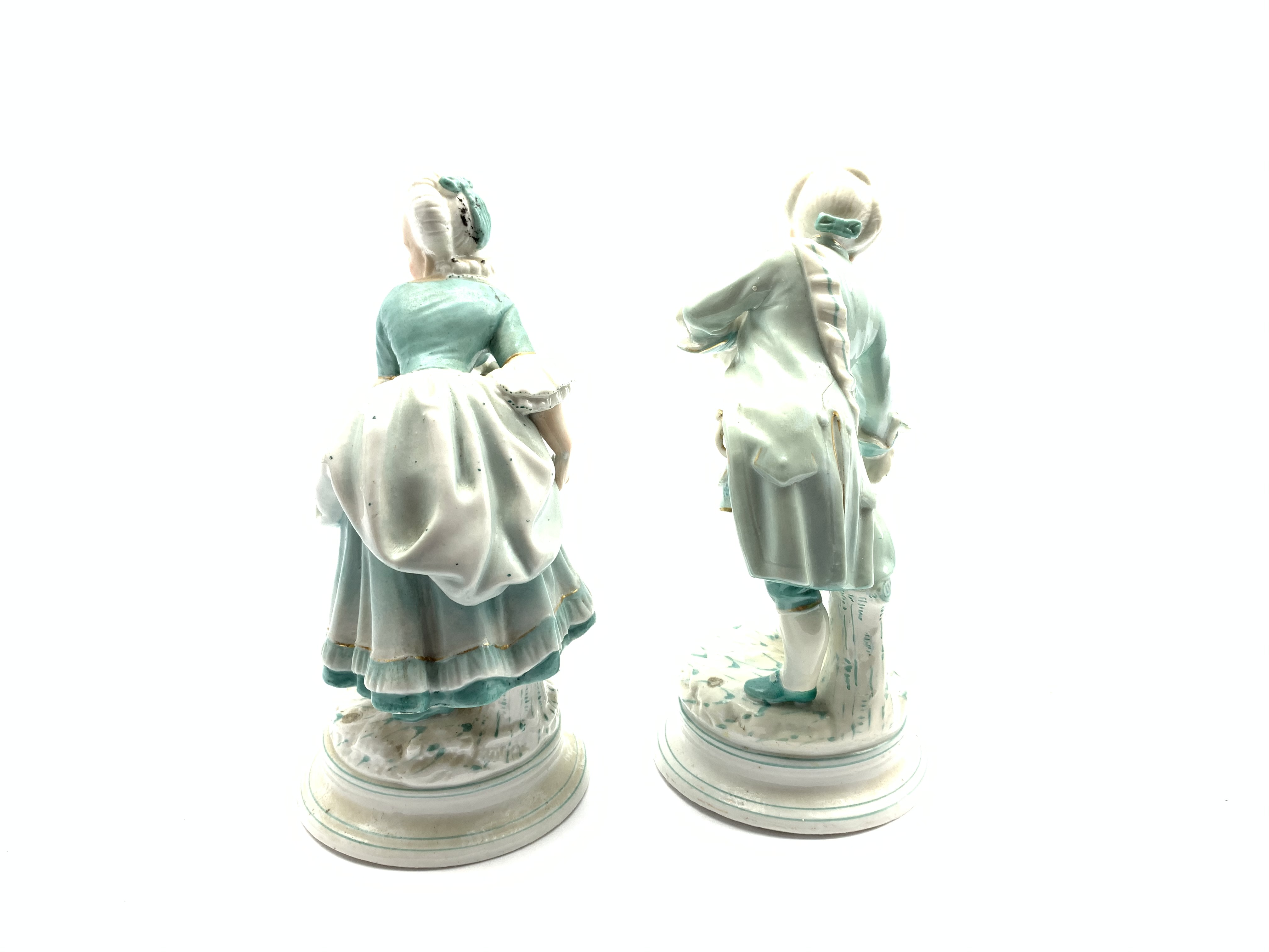 Pair of 19th Century porcelain male and female figures each holding a flower on blue lined circular - Image 5 of 6