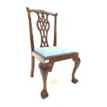 20th century miniature mahogany Hepplewhite style with leaf carved cresting rail over pierced splat,