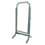 20th century painted hardwood cheval dressing mirror, raised on splayed supports with brass castors,