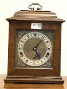 20th century Elliot mahogany cased mantel clock, silvered dial with Roman numeral chapter ring,