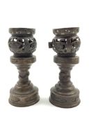 Pair of late 19th/20th Century Chinese bronze censers with pierced decoration on pedestal stands