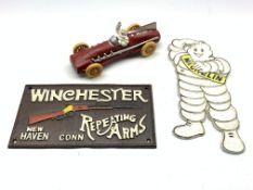 Reproduction Michelin Man racing car and wall plaque and a cast metal plaque reading 'Winchester,