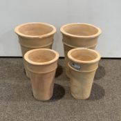 Pair cylindrical tapering planters,