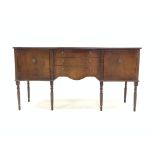 Georgian design mahogany serpentine front sideboard, two cupboards flanking three drawers,