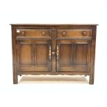 20th century oak dresser base, with two drawers over two cupboards,