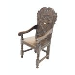 18th century and later oak Wainscote chair, scroll carved back panel,
