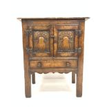 18th century style side cupboard with carved panelled doors above single drawer,