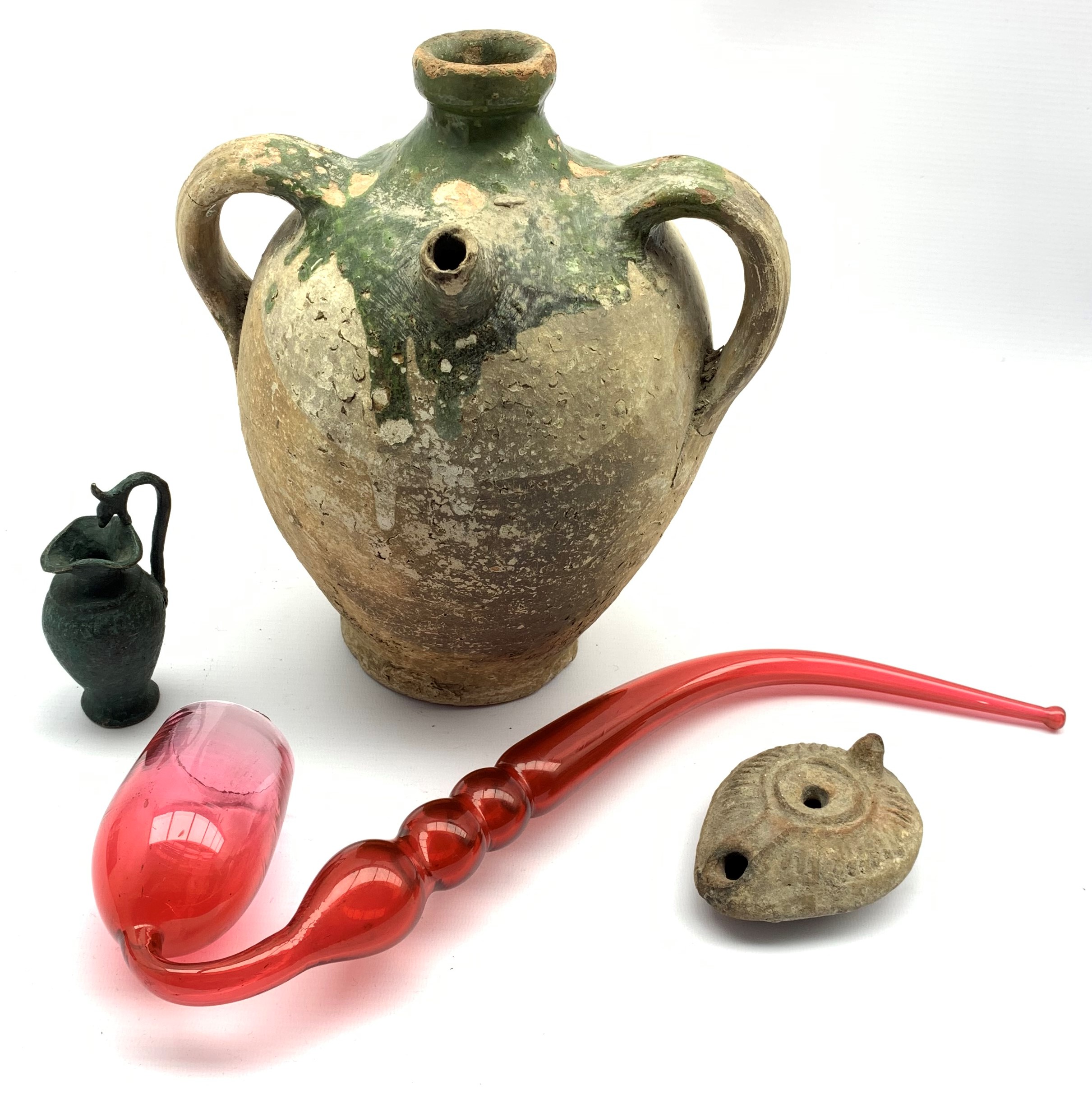 Three antiquities comprising a stoneware flask,