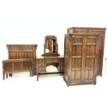 Early 20th century carved oak bedroom suite, comprising of double wardrobe fitted with hanging rail,