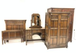 Early 20th century carved oak bedroom suite, comprising of double wardrobe fitted with hanging rail,