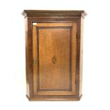 19th century oak and mahogany banded corner cupboard, with chequered, sting and shell inlay,