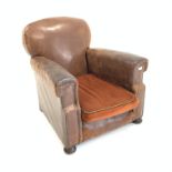 19th century club armchair, upholstered in studded leather, with loose cushion,