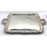 Large plated two handled oblong tray with shell and floral moulded border 76cm (including handles)