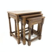 Oak nest of three tables, each with rectangular tops over fluted frieze,