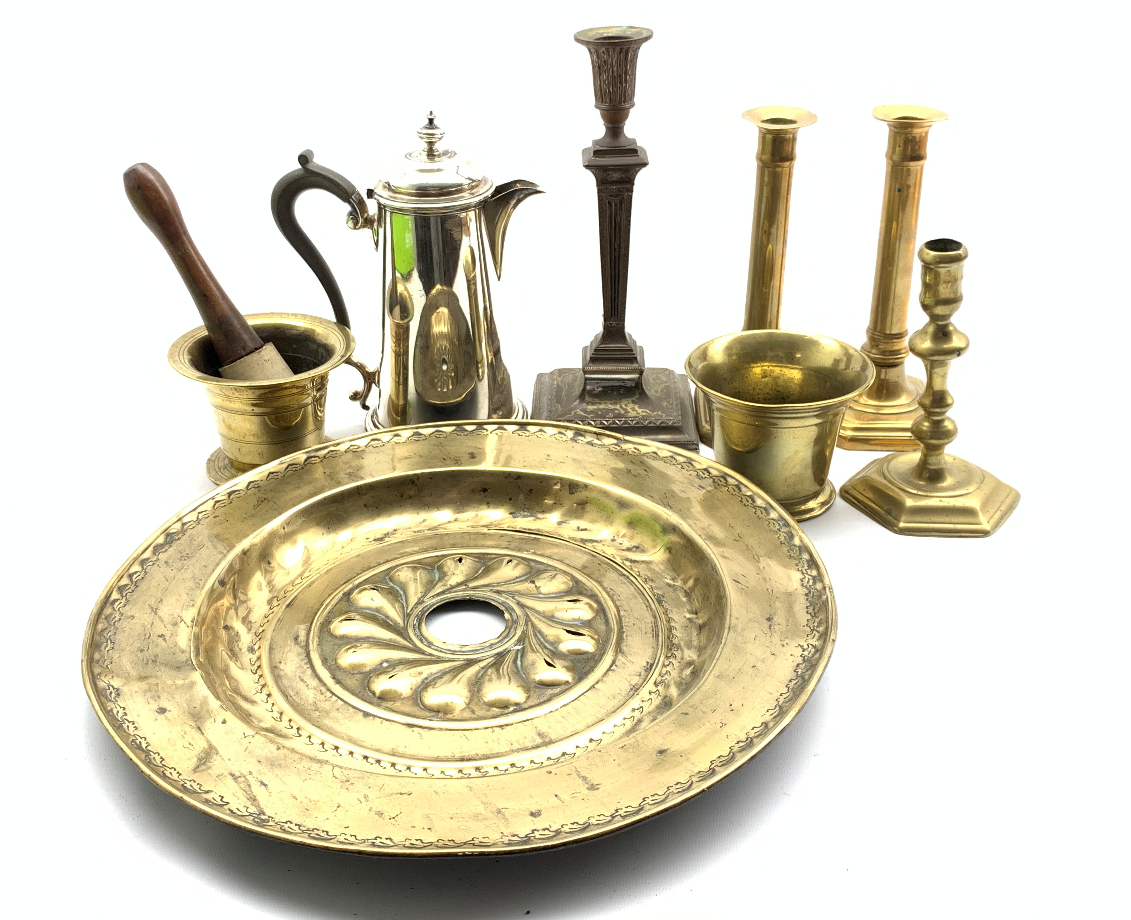 17th Century brass alms dish with embossed decoration D39cm, 18th Century brass candlestick,