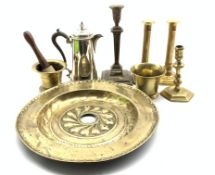 17th Century brass alms dish with embossed decoration D39cm, 18th Century brass candlestick,