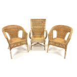 Pair of tub shaped cane armchairs, (W54cm) and another cane armchair,