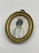 Miniature oval silhouette of an officer painted on glass,