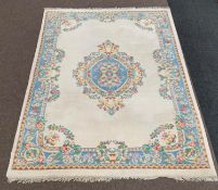 Indian Ivory ground carpet, floral medallion on ivory field, pastel blue boarder,