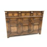 20th century carved oak dresser base, with three drawers over three cupboards, W122cm, H84cm,