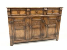 20th century carved oak dresser base, with three drawers over three cupboards, W122cm, H84cm,