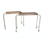 Pair 20th century trolleys, with elm veneered tray tops raised on steel supports and castors,