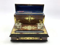 Victorian birds eye maple inkstand with applied brass mounts fitted with a domed stationery casket