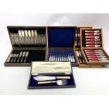 Set of six engraved plated fish knives and forks, boxed,