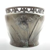 Japanese bronze jardiniere with a raised pattern of bulrushes and reeds with traces of gilt and a