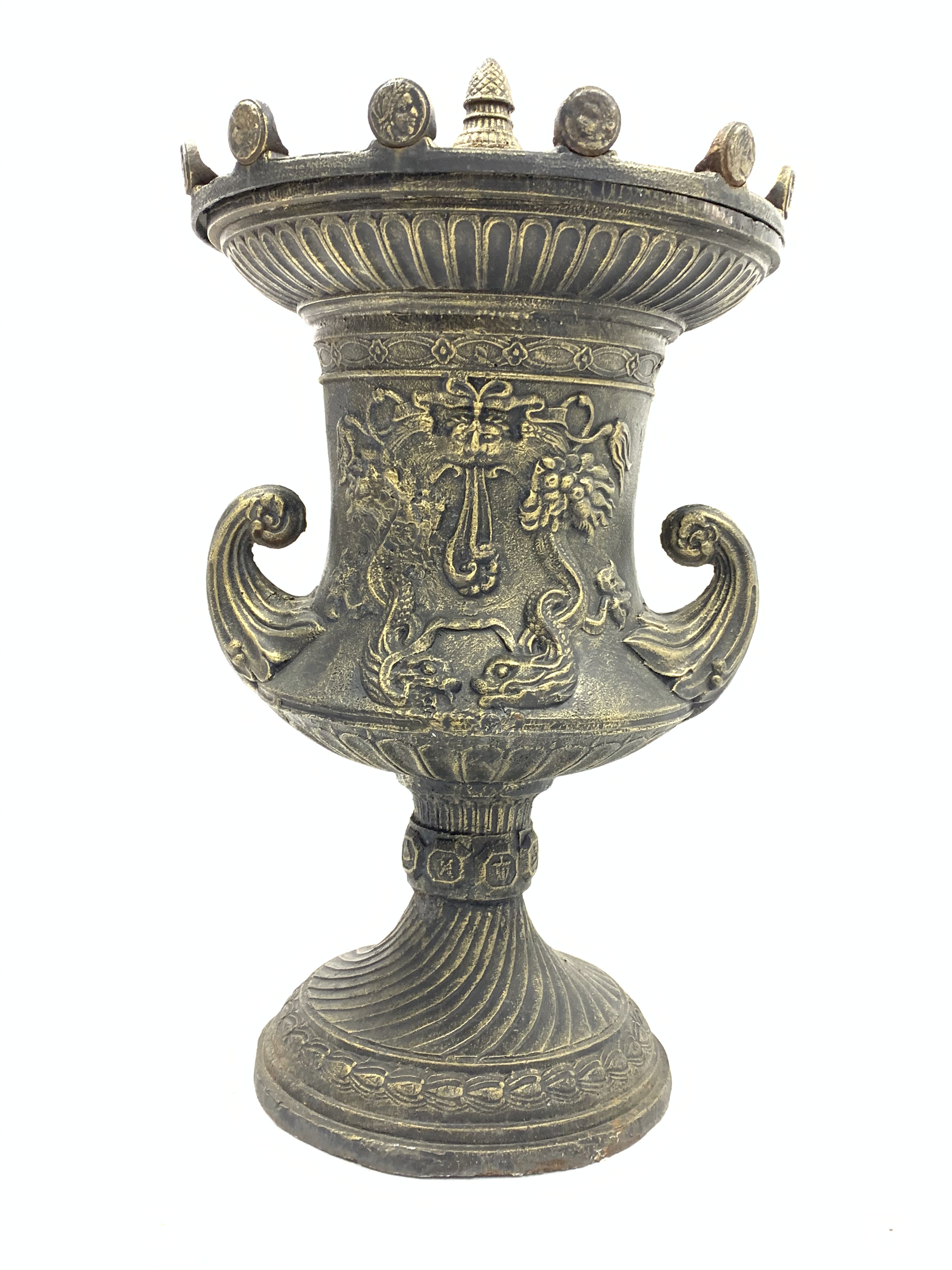 Large bronze finish cast iron garden urn, decorated with foliage swags and dolphins,