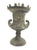 Large bronze finish cast iron garden urn, decorated with foliage swags and dolphins,
