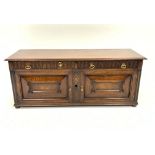 20th century oak low dresser in the Jacobean style,