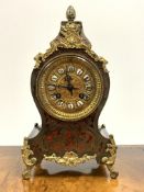 20th century simulated Boulle work cartouche shaped mantel clock, with gilt metal dial and mounts,