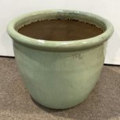 Large green glazed terracotta plant pot,