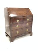 Early 19th century oak bureau, fall front revealing fitted interior,