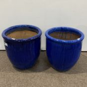 Two similar blue glazed terracotta planters,