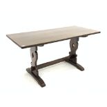 20th century oak refectory style dining table, with shaped and pierced panel end supports,