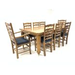 Solid oak telescopic dining table, the top with canted corners,