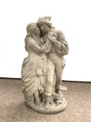 Reconstituted stone statue of a courting couple,