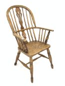 19th century elm hoop back Windsor armchair, pierced splat over saddle seat,
