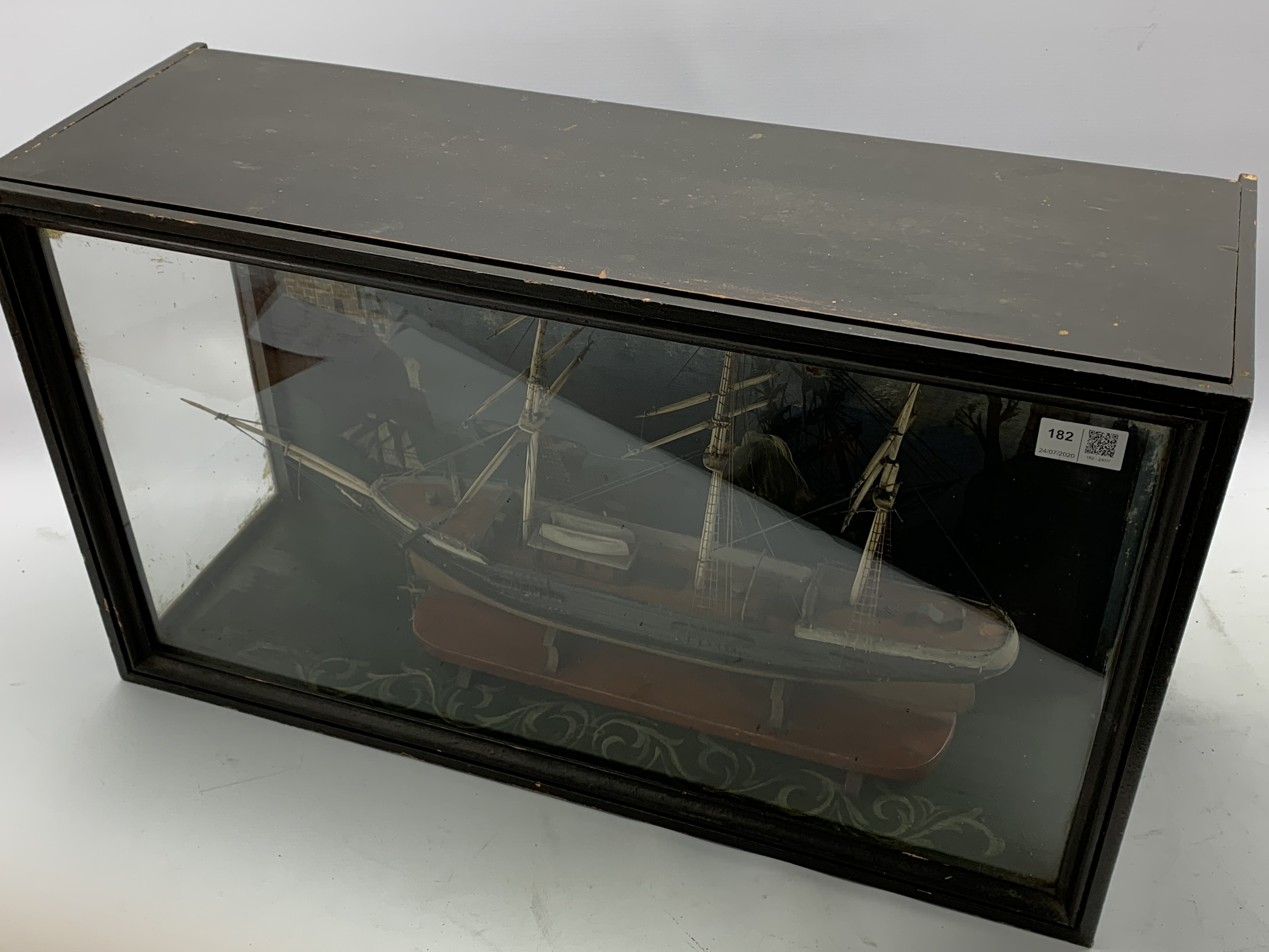 Model of a three masted sailing ship in a glazed display case with painted background 39cm x 67cm x - Image 2 of 2
