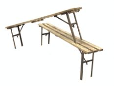 Pair of vintage slatted pine trestle benches, with folding cast iron supports, L174cm, H51cm,